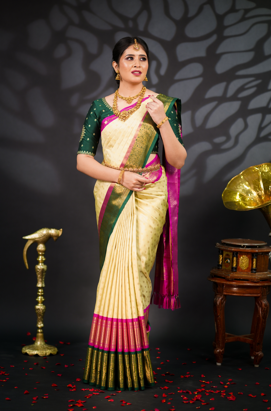 Luxurious Cream Pure Kanjivaram Silk Saree with Rich Gold Zari Work & Magenta-Green Border – Perfect for Bridal & Wedding Collection