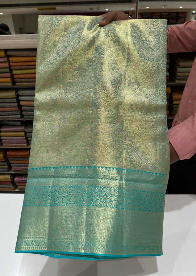 Grand Pista Green Pure Silk Saree with Blue Border and Silver Zari Weaving