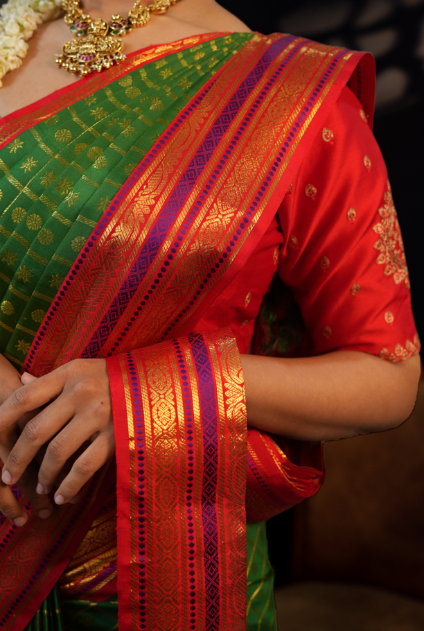 Green & Red Pure Kanjivaram Silk Saree with Rich Golden Zari Buttas – Traditional Bridal & Festive Wear