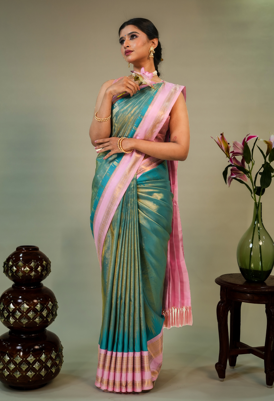 Green Kanjivaram Silk Saree with Contrast Pink Border and Rich Golden Zari Work – Wedding Special