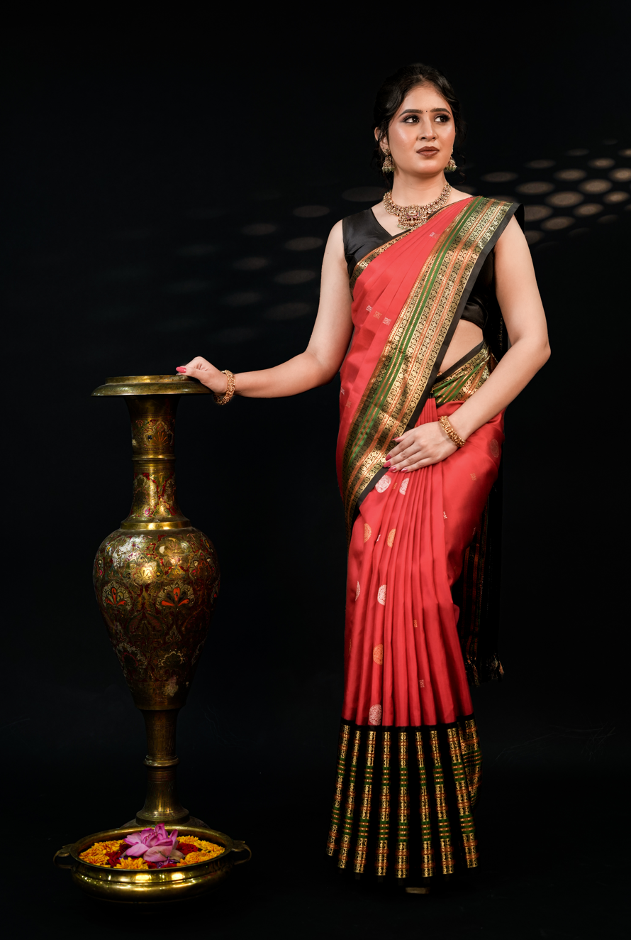 Red Pure Kanjivaram Silk Saree with Black Border & Gold Zari Buttas – Traditional Wedding & Bridal Collection