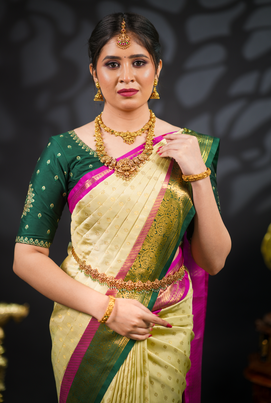 Luxurious Cream Pure Kanjivaram Silk Saree with Rich Gold Zari Work & Magenta-Green Border – Perfect for Bridal & Wedding Collection
