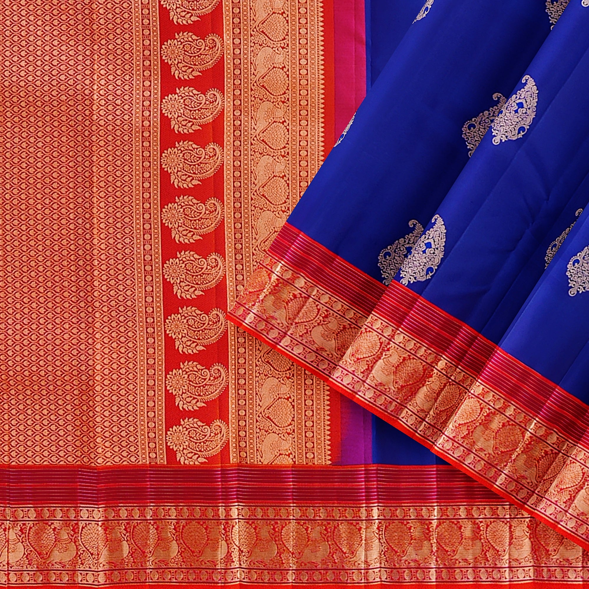 Bluish Purple Kanjivaram Silk Saree with Orange Zari and Peacock Border – Pure Handloom Bridal Saree Online - New Sudarshan Silks`